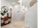Welcoming entryway with neutral walls, stylish decor, tiled flooring, and easy access to other rooms at 7476 Opal Star St, North Las Vegas, NV 89084