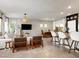 Inviting living space featuring an open layout, modern kitchen, and stylish furnishings at 7476 Opal Star St, North Las Vegas, NV 89084