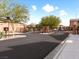 Gated community entrance providing security and privacy with well maintained landscaping on entry at 7476 Opal Star St, North Las Vegas, NV 89084