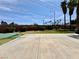Spacious backyard with palm trees and brick perimeter at 8072 Hackberry Dr, Las Vegas, NV 89123