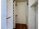 Walk-in closet with built-in storage shelves and clothing rods at 8072 Hackberry Dr, Las Vegas, NV 89123