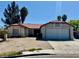 Charming single-story home with desert landscaping and a two-car garage on a sunny day at 8072 Hackberry Dr, Las Vegas, NV 89123