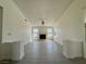 Bright, open living room features a fireplace, high ceilings and wood laminate flooring at 8072 Hackberry Dr, Las Vegas, NV 89123