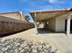 Covered patio offers shade and access to the backyard at 8072 Hackberry Dr, Las Vegas, NV 89123
