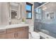 Modern bathroom with vanity and glass enclosed shower at 818 Laceleaf St, Las Vegas, NV 89138