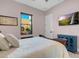 Bedroom with a comfortable bed, light walls and a view from the window at 818 Laceleaf St, Las Vegas, NV 89138