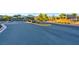 A landscaped entrance with signage reading Sandalwood at 818 Laceleaf St, Las Vegas, NV 89138