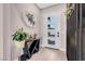 Bright entryway features wood floors, modern decor, and a stylish front door with glass panels at 818 Laceleaf St, Las Vegas, NV 89138