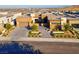 Modern home with desert landscaping, a paver driveway, and an attached two-car garage at 818 Laceleaf St, Las Vegas, NV 89138