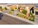 Contemporary home with desert landscaping, a paver driveway, and an attached two-car garage at 818 Laceleaf St, Las Vegas, NV 89138