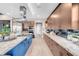 Bright kitchen featuring modern appliances, granite countertops and wood floors at 818 Laceleaf St, Las Vegas, NV 89138