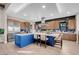 Modern kitchen with stainless steel appliances, a large center island, and sleek cabinetry at 818 Laceleaf St, Las Vegas, NV 89138