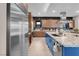 Contemporary kitchen boasts stainless steel fridge and modern appliances at 818 Laceleaf St, Las Vegas, NV 89138