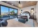 Comfortable main bedroom with wood ceiling, patio access, and outside relaxation area at 818 Laceleaf St, Las Vegas, NV 89138