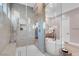 Contemporary walk-in shower with dual shower heads and modern tile design at 818 Laceleaf St, Las Vegas, NV 89138