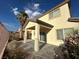 Cozy backyard with covered patio, desert landscaping, and inviting ambiance for relaxation and gatherings at 8205 Celina Hills St, Las Vegas, NV 89131
