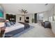 This spacious main bedroom features a ceiling fan and a private outdoor balcony at 845 Loch Katrine Ave, Henderson, NV 89012