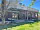 Spacious backyard with covered patio and manicured lawn at 8690 W Ford Ave, Las Vegas, NV 89148