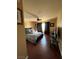 Bedroom with wood floors, ceiling fan and lots of natural light at 8690 W Ford Ave, Las Vegas, NV 89148