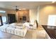 Cozy living room showcases a brick fireplace, plush seating, and abundant natural light at 8690 W Ford Ave, Las Vegas, NV 89148