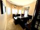 Office with large wood desk, shelving, and shutters allowing natural light to fill the room at 8690 W Ford Ave, Las Vegas, NV 89148