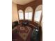 Cozy sitting room with large windows and wood flooring at 8690 W Ford Ave, Las Vegas, NV 89148