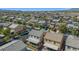 Home's aerial view showcases surrounding neighborhood and solar panels on nearby houses at 9113 Sea Mink Ave, Las Vegas, NV 89149