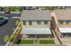Aerial view of backyard showing artificial turf and covered patio at 9113 Sea Mink Ave, Las Vegas, NV 89149