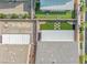 Aerial view of the backyard showing artificial turf and covered patio at 9113 Sea Mink Ave, Las Vegas, NV 89149