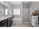 Bathroom featuring soaking tub, separate shower, and modern finishes at 9113 Sea Mink Ave, Las Vegas, NV 89149