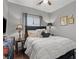 Cozy bedroom featuring a ceiling fan and natural light, creating a relaxing atmosphere at 9113 Sea Mink Ave, Las Vegas, NV 89149