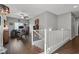 View of the upstairs loft space featuring wood floors and natural light at 9113 Sea Mink Ave, Las Vegas, NV 89149