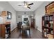 Cozy office space with wood floors, a ceiling fan, and natural lighting at 9113 Sea Mink Ave, Las Vegas, NV 89149