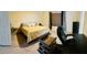 Spacious bedroom featuring neutral carpet, a desk and chair, and one window at 10077 Cooper Mountain St, Las Vegas, NV 89141
