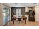 Eat-in kitchen featuring modern appliances, ample counter space, and a sliding glass door at 10666 Cherry Ridge Ct, Las Vegas, NV 89129