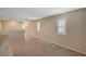 Bright loft area with neutral carpeting, fresh paint, and two windows with plantation shutters at 10666 Cherry Ridge Ct, Las Vegas, NV 89129