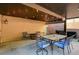 Outdoor patio with stylish wrought iron furniture and overhead lighting, great for entertaining at 10666 Cherry Ridge Ct, Las Vegas, NV 89129