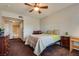 Spacious bedroom with carpet flooring, featuring a ceiling fan and tasteful furnishings at 10809 Garden Mist Dr # 2050, Las Vegas, NV 89135