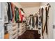 Organized walk-in closet with custom shelving and storage drawers, maximizing space and convenience at 10809 Garden Mist Dr # 2050, Las Vegas, NV 89135