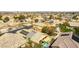 Aerial view of a neighborhood featuring homes with solar panels and private pools at 115 Cora Hills Ct, Las Vegas, NV 89148