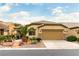 Charming single-story home with desert landscaping and a two-car garage in a sunny neighborhood at 115 Cora Hills Ct, Las Vegas, NV 89148