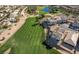Scenic aerial view of the golf course and surrounding homes at Rhodes Ranch at 115 Cora Hills Ct, Las Vegas, NV 89148