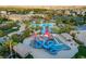 Aerial shot of community water park, pool, picnic facilities and other amenities at 115 Cora Hills Ct, Las Vegas, NV 89148
