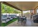 Covered patio with outdoor seating and barbecue area, perfect for entertaining at 1152 Pine Cove Ct, Henderson, NV 89011