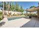 This backyard has a rectangular pool, and covered patio, perfect for outdoor enjoyment at 11540 Snow Creek Ave, Las Vegas, NV 89135