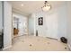 Spacious foyer with tile flooring, neutral walls, and views into the office and other living areas at 11540 Snow Creek Ave, Las Vegas, NV 89135