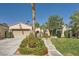 Charming single-story home features a well-manicured lawn, desert landscaping, and inviting entrance at 11540 Snow Creek Ave, Las Vegas, NV 89135