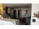 Functional kitchen with ample counter space, black and white wallpaper, and essential appliances at 1653 Crystal Shadows Cir, Las Vegas, NV 89119