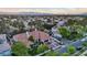 Lovely single-story home with a tile roof, well-manicured landscaping, and an attached three-car garage at 2355 Villandry Ct, Henderson, NV 89074