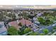 Stunning single-story home with a tile roof, well-manicured landscaping, and an attached three-car garage at 2355 Villandry Ct, Henderson, NV 89074